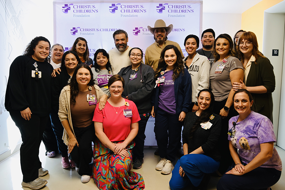 Intocable and CHRISTUS Staff